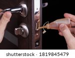 adjusting inner door lock using lubricating oil. indoors. fixing door squealed domestic problem.
