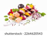 Small photo of Raw chicken meat skewers with vegetables,plums,yellow pepper,onions,with spices,herbs white background.Uncooked meat skewer.Skewers with pieces of raw meat.Top view.Chicken Skewers breast fillet meat.