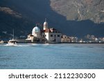 Small photo of Island Gospa od Skrpjela in Montenegro bay. Picturesque Gospa od Skrpela Island in Boka Kotor Bay.