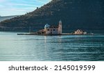 Small photo of Island Gospa od Skrpjela in Montenegro bay. Gospa od Skrpjela, Perast, Kotor Bay, Montegro. Church Our Lady of Rocks on island in Boka Kotor bay, Montenegro