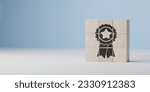 Small photo of Quality warranty concept. wooden cubes with quality warranty icon with blue background. banner and advertising product and service quality commitment. Goals achievement and business success