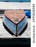 Wooden Rowboat Resting Upside...
