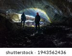 Two Man Exploring Dark Cave...