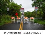 Small photo of Roadblock in front of a lava flow of the Fissure 8 covering a road in the Leilani Estates near Hilo in the southeast of Big Island, Hawaii, USA