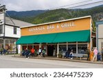 Small photo of Skagway, Alaska - August 24, 2023 : Old city center of Skagway, Alaska - Vintage storefront of Bonanza Bar and Grill in the Klondike Gold Rush National Historic Park