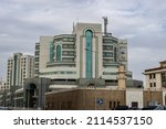 Small photo of Riyadh, Saudi Arabia - December 26, 2021: Taj Center and Al Hussy Mosque in Al Batha