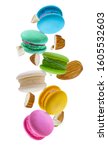 flying macaroons with almond... | Shutterstock . vector #1605532603