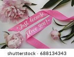 Small photo of Photo of peonies and a satin pink ribbon with an inscription "Just because I love you!" for postcard, poster