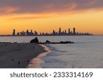Sunset view of the Gold Coast skyline with Currumbin rock in foreground seen from Elephant rock in Currumbin, Queensland