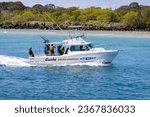 Small photo of Tweed Heads, September 15, 2023. Fishing boats sail along the Tweed River inlet in eastern Australia