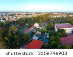 Aerial tour over the famous planetarium Luis Enrique Erro of the National Polytechnic Institute surrounded by nature on a quiet morning