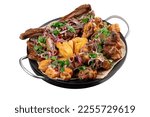 Assorted grilled meat with herbs and potatoes on a large plate. Pieces of a mix of fried meat from chicken, beef, pork and lamb, isolated on white