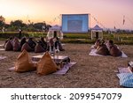 Small photo of Nan Thailand December 2021, people looking movies at outdoor cinema at night in Nan Thailand., outdoor movie film