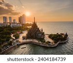 Small photo of Skyline of Pattaya city at sunset with The Sanctuary of Truth wooden temple in Pattaya Thailand, gigantic wooden construction located at the cape of Naklua Pattaya City Chonburi Thailand