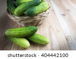 Fresh Cucumbers In Basket On...