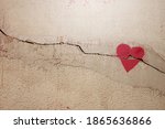 A Heart Painted On A Cracked...