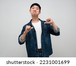 Small photo of Asian man jeans shirt gesture point finger at himself arrogant isolated