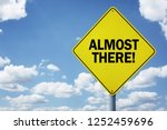 Almost there road sign concept for business motivation, encouragement and approaching a destination or goal