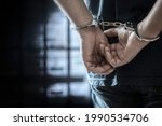 Arrested Man In Handcuffs With...