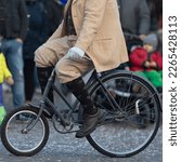 Small photo of Throwback to Yesteryear: Vintage Bicycle Rolls Through Carnevale Parade