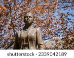 Small photo of Falmouth, MA - May 6, 2023: Bronze sculpture, by Lloyd Lillie, of Katharine Lee Bates at the summit of Pikes Peak, where she thought of the words that would become the lyrics to America the Beautiful.