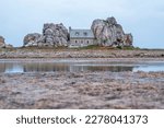 Small photo of Castel Meur, known as the Maison du Le gouffre de Plougrescant or "the house between the rocks", is a charming country house surrounded by two huge wedged rocks. French Brittany.