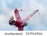 Bright Red Tower Crane Against...