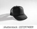 Trucker cap, snapback, all black, black mesh. Isolated on white. Mock-up for branding