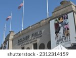 Small photo of Chicago, Illinois, USA - June 3, 2023: Soldier Field Main Entrance with Taylor Swift Eras Tour Posters