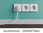A white electrical outlet on...