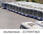 City buses in a row in a...