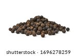 Pile of black peppercorns ...