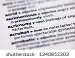 Small photo of Blurred close up to the partial dictionary definition of Acrimony