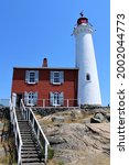 Small photo of Victoria and Colwood British Columbia June 29, 2021 - Fisgard Lighthouse located in Fort Rodd Hill National Historic site in Canada.