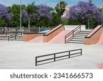 Brand new beautiful public skatepark during springtime 