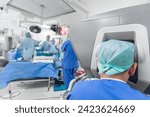 Small photo of Surgeon performing robotic surgery with robotic device. Surgeon using a robotic surgical system to facilitate complex surgery. preparation for performing robotic surgery, doctor's hands.