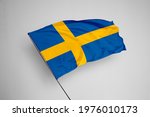 Sweden flag isolated on white background with clipping path. close up waving flag of Sweden. flag symbols of Sweden. Sweden flag frame with empty space for your text.