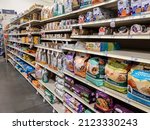 Small photo of Woodinville, WA USA - circa February 2022: Angled, selective focus of the dry and wet cat food aisle inside of a Petsmart store.