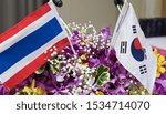 Small photo of Thailand and South Korea national flag are stand beside each other, in concept of corroboration, supportive, friendship.