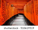 Red Torii gates in Fushimi Inari shrine in Kyoto, Japan