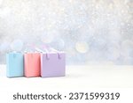 Holiday gift boxes and packages on bokeh background with place for text,new year sale and shopping concept, black friday,advertising banner for store and screen, selective focus