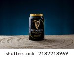 Small photo of 17 Aug 2021, Penang. Guinness Foreign Extra Stout can beer product advertisement photo.