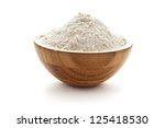 Wheat flour in wooden bowl