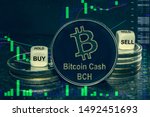 The coin cryptocurrency Bitcoin Cash BCH stack of coins and dice. Exchange chart to buy, sell, hold.