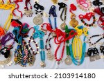 Small photo of Kolkata, West Bengal, India - 31st December 2018 : Various shapes and shades of necklaces , handicrafts on display during the Handicraft Fair. It is the biggest handicrafts fair in Asia.