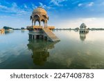 Small photo of Chhatris, dome-shaped pavilions on Gadisar or Gadaria lake, Jaisalmer, Rajasthan, India. Built by King Rawal Jaisal,rebuilt by Gadsi Singh. An artificial lake once only water source of Jaisalmer city.