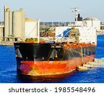 Small photo of Florida, United States-January 25, 2020: CSL Argosy, a self discharging bulk carrier, docking at port of Tampa bay
