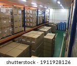 Small photo of Subang, Malaysia, May 1 2020: Warehouse. A big messy and various types of box sizes and shapes are stored here depending on the product. Some area had little big noise. Selective focus.