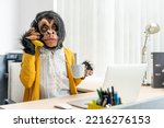 Small photo of Monkey Business Woman talking on banana phone