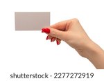 Empty card in woman hand with red nails  isolated on a white background. Copy space. 